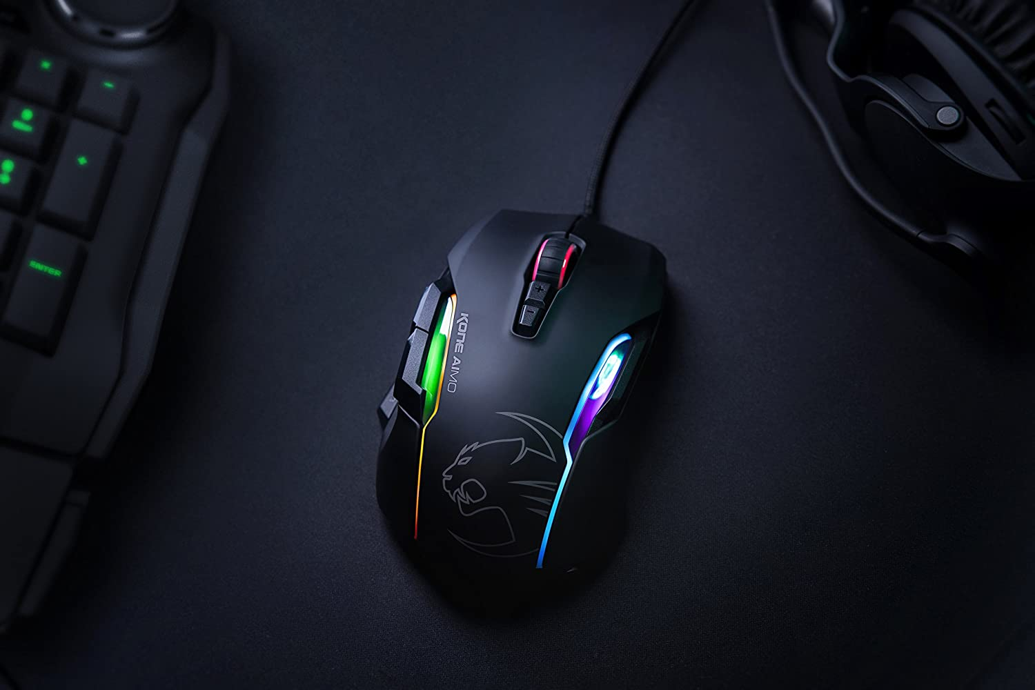 Lwzwigie Roccat Https://Youtu.be/Mfk3Bmiiu8C Roccat® Swarm Powered – Comprehensive Driver Suite With A Striking Design And A Stunning Feature Set, The Kone Aimo Channels The Legacy Of Its Predecessor. It Boasts Refined Ergonomics With Enhanced Button Distinction, But What Truly Sets It Apart Is Its Rgba Double Lightguides Powered By The State-Of-The-Art Aimo Intelligent Lighting System. Aimo Is The Vivid Illumination Eco-System From Roccat®. Its Functionality Grows Exponentially Based On The Number Of Aimo-Enabled Devices Connected. It Also Reacts Intuitively And Organically To Your Computing Behavior. Eliminating The Need For Configuration, It Presents A State-Of-The-Art Lighting Scenario Right Out Of The Box, For A Completely Fluid, Next-Gen Experience. The Kone Aimo Features A Tri-Button Thumb Zone For A New And Even Greater Level Of Control. It Includes Two Wide Buttons Suitable For All Hand Sizes, Plus An Ergonomic Lower Button Set To Easy-Shift[+]™ By Default. Easy-Shift[+]™ Is The World-Famous Button Duplicator Technology That Lets You Assign A Secondary Function To The Mouse'S Buttons. It'S Easy To Program And Has Options For Simple Commands And Complex Macros. Roccat - ماوس ألعاب مخصص ذكي من Kone Aimo Rgba (أسود) 23 مفتاحًا قابلًا للبرمجة ، مصمم في ألمانيا