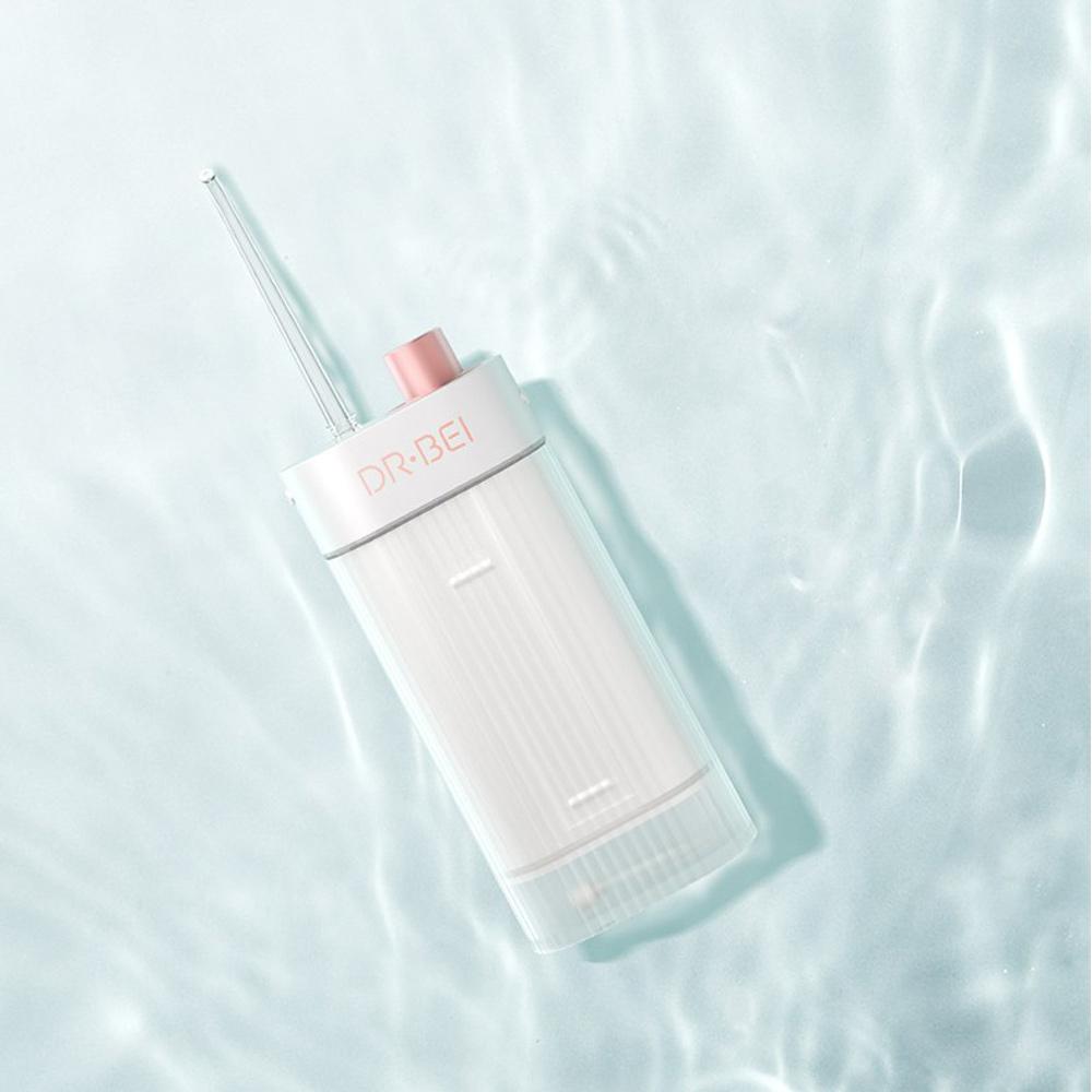 Dr Bei F3 Portable Oral Irrigator Dental Device White 901342 Xiaomi - The Water Tank Is Subtly Transformed Into A Storage Container With A Strong Impulse - The Front Is Only The Size Of A Mobile Phone, Which Is Easy To Handle And Carry On Business Trips - The High-Frequency Powerful Pressure-Stabilized Water Pump Sprays The Water Column Under High Pressure At A Frequency Of 1600 Times/Minute, With A Diameter As Thin As 0.6Mm. In-Depth Cleaning Of Teeth Gaps, Removal Of Stubborn Plaque - The Water Inlet And The Nozzle Storage Bin Are Combined Into One To Avoid The Risk Of Contamination Of The Nozzle, And The Water Inlet Is Convenient For Daily Use And Cleaning - 360° Rotatable Nozzle Dr.bei F3 Portable Oral Irrigator Dental Device - White